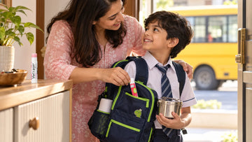 Mother tucking a Dirty Good Watermelon chapstick into her son's school bag before the school bus