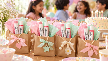 Return-gift bags at a kids' party with Dirty Good Strawberry and Watermelon chapsticks from the Fruit Pop Pair