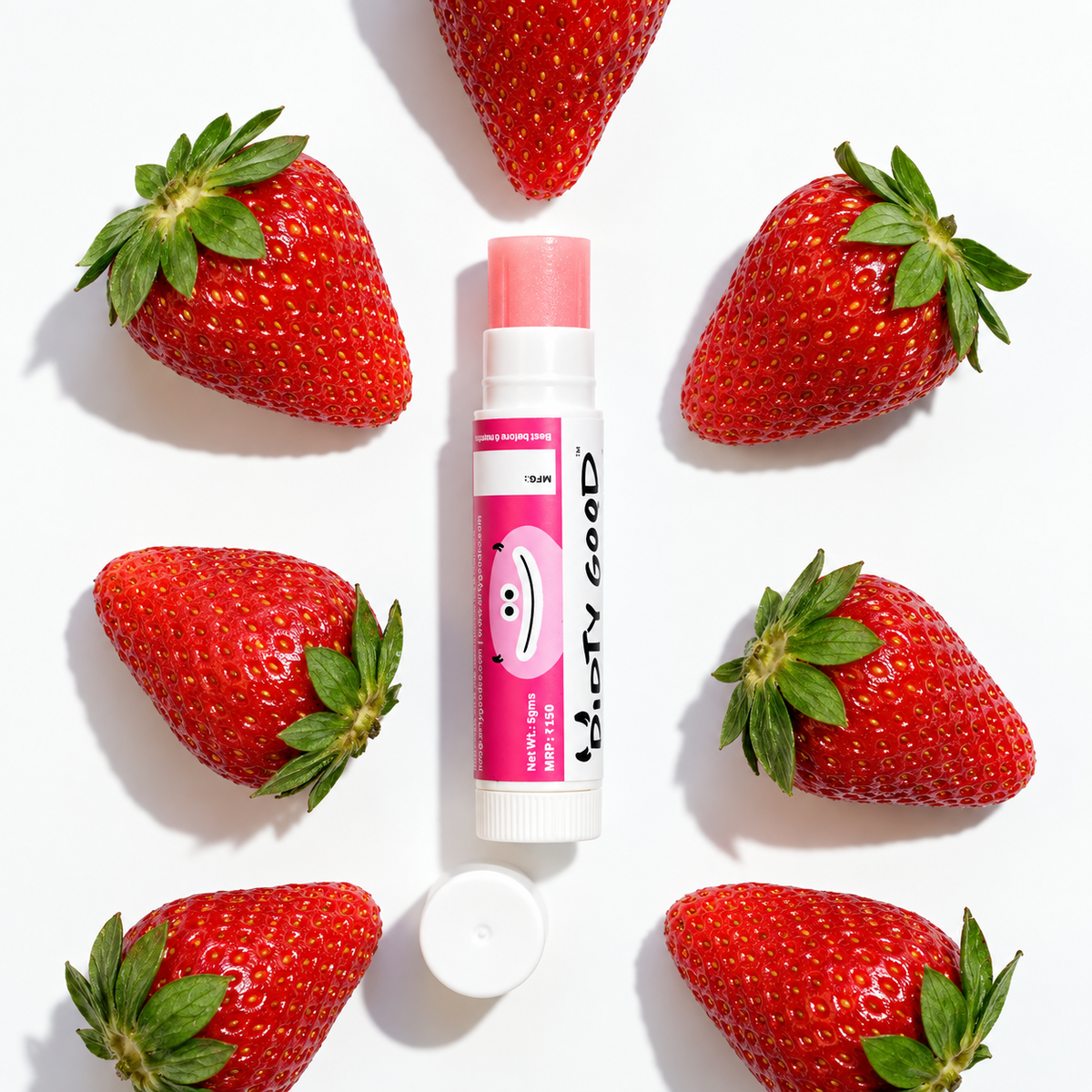 Strawberry chapstick with strawberries on white