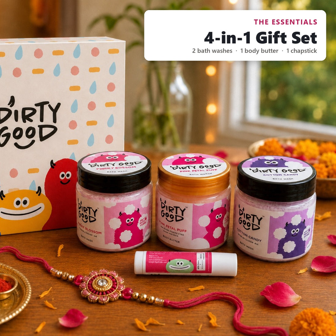 The Essentials 4-in-1 kids gift set for girls, styled for Rakhi: Cotton Candy and Cherry Blossom bath washes, Pink Petal Puff body butter and a Strawberry chapstick with the Dirty Good gift box