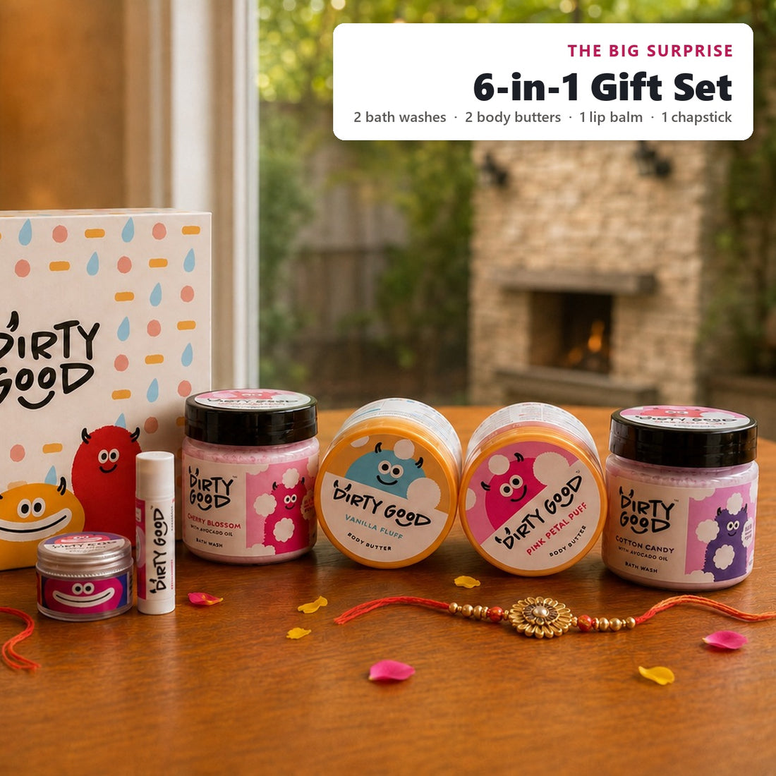 The Big Surprise 6-in-1 kids gift hamper for girls, styled for Rakhi: Cotton Candy and Cherry Blossom bath washes, Pink Petal Puff and Vanilla Fluff body butters, Strawberry lip balm and Berry Blast chapstick