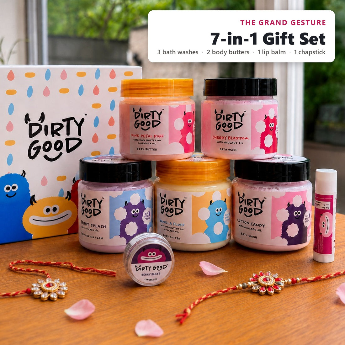 The Grand Gesture 7-in-1 kids gift hamper for girls, styled for Rakhi: Cotton Candy, Cherry Blossom and Mermaid Splash bath washes, Pink Petal Puff and Vanilla Fluff body butters, Berry Blast lip balm and Strawberry chapstick